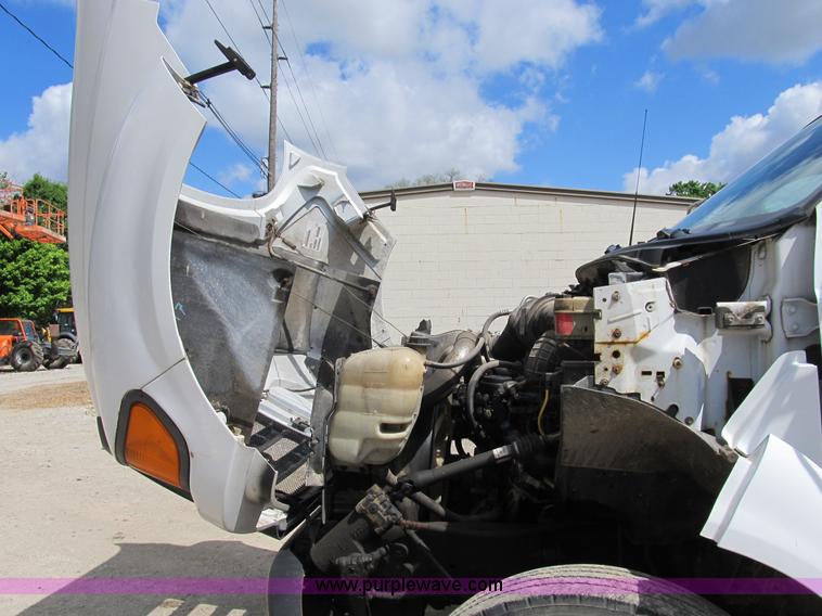 image for item B2709 2004 Ford F650 XL Super Duty flat bed truck