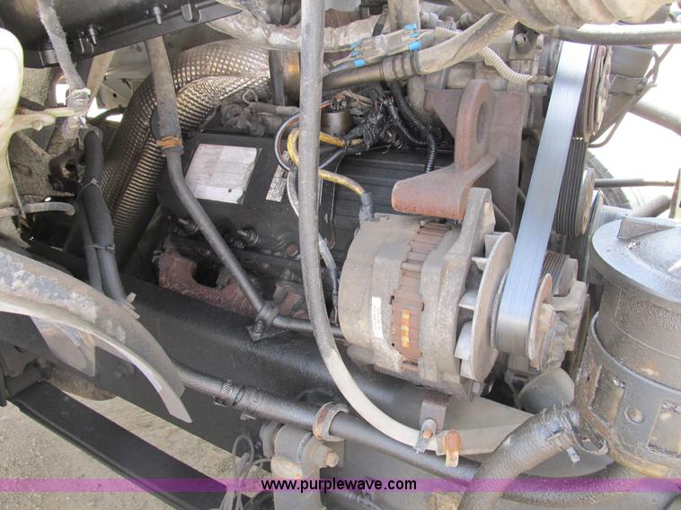 image for item B2709 2004 Ford F650 XL Super Duty flat bed truck