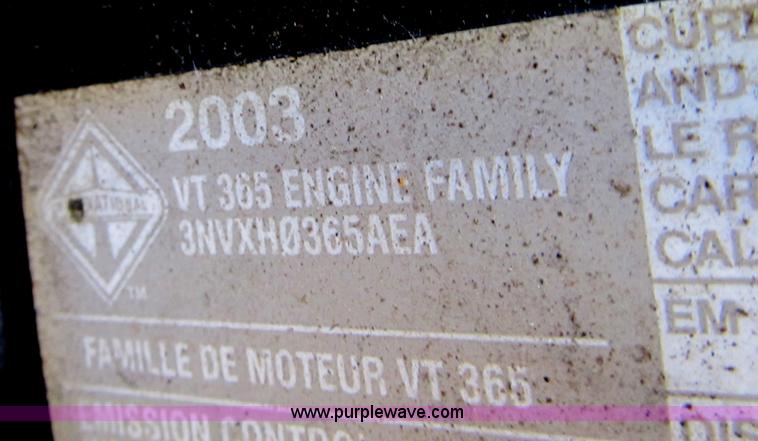 image for item B2709 2004 Ford F650 XL Super Duty flat bed truck