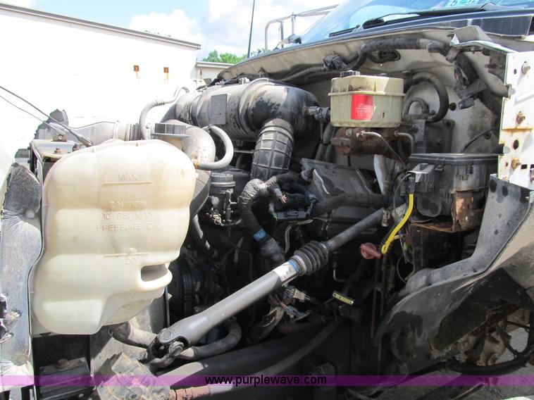 image for item B2709 2004 Ford F650 XL Super Duty flat bed truck