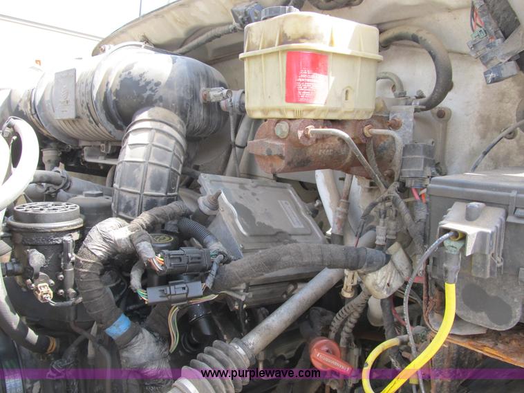 image for item B2709 2004 Ford F650 XL Super Duty flat bed truck