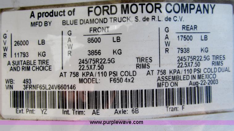 image for item B2709 2004 Ford F650 XL Super Duty flat bed truck