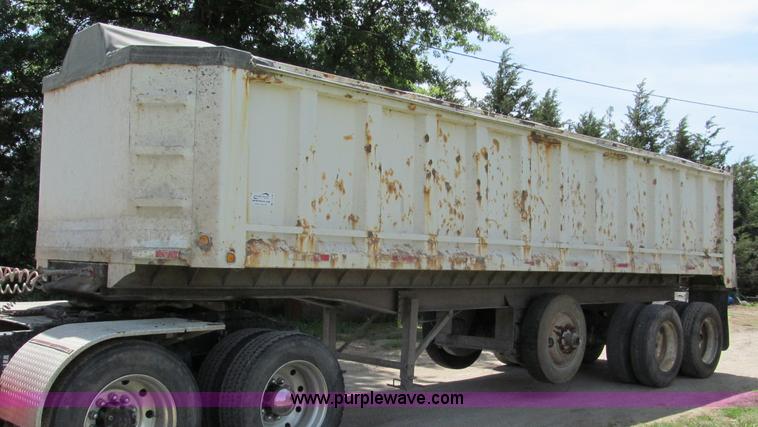 image for item C2169 1978 Copcow triple axle end dump trailer