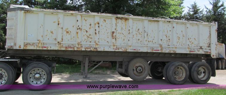 image for item C2169 1978 Copcow triple axle end dump trailer