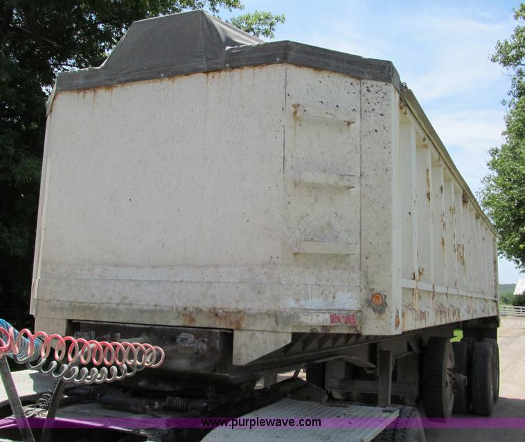 image for item C2169 1978 Copcow triple axle end dump trailer