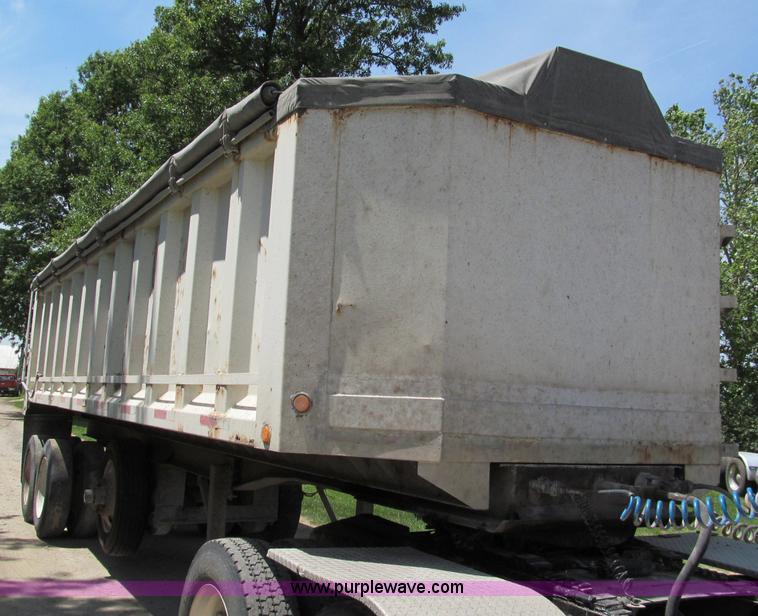 image for item C2169 1978 Copcow triple axle end dump trailer