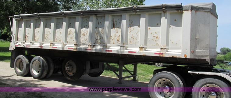 image for item C2169 1978 Copcow triple axle end dump trailer