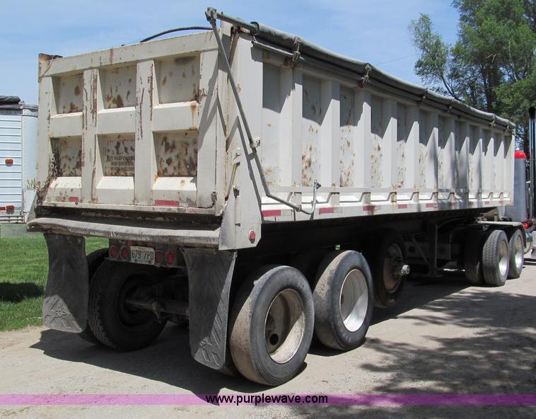 image for item C2169 1978 Copcow triple axle end dump trailer