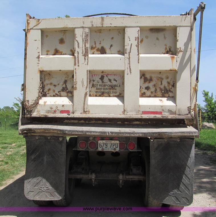 image for item C2169 1978 Copcow triple axle end dump trailer