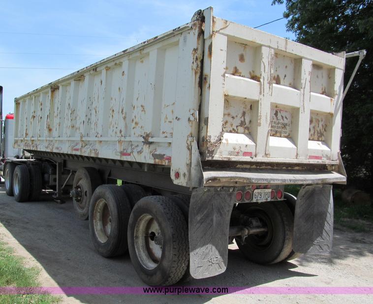 image for item C2169 1978 Copcow triple axle end dump trailer