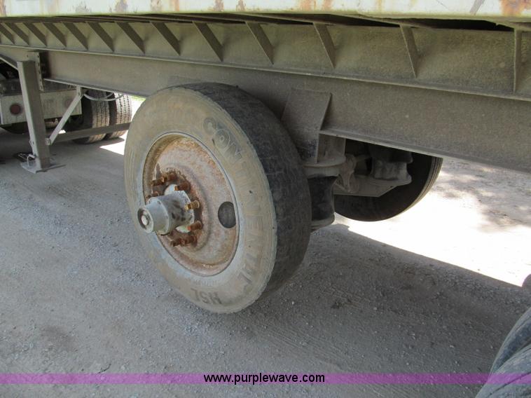 image for item C2169 1978 Copcow triple axle end dump trailer