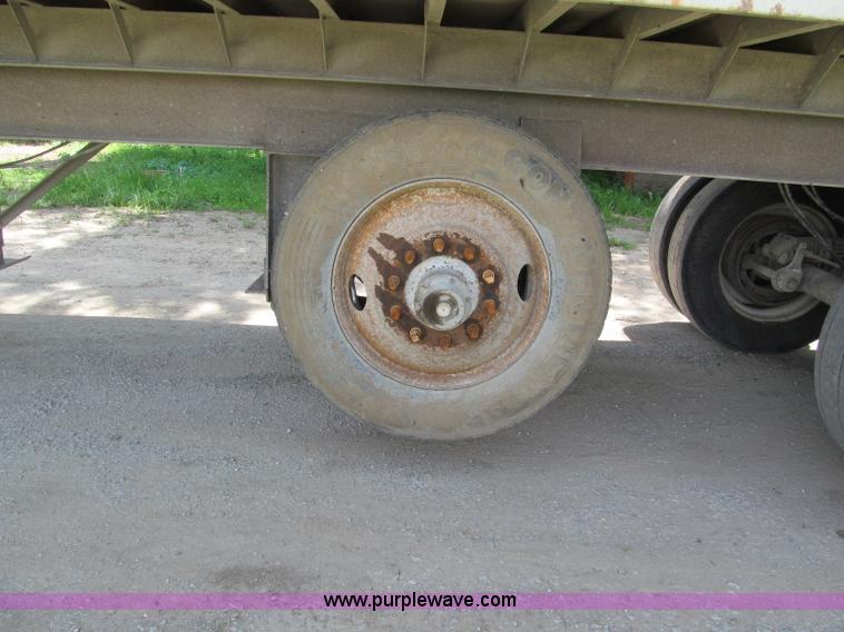 image for item C2169 1978 Copcow triple axle end dump trailer