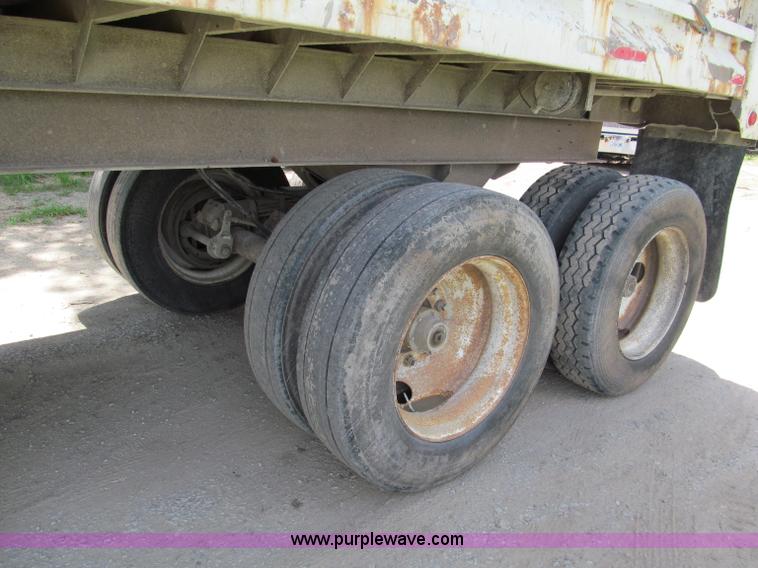 image for item C2169 1978 Copcow triple axle end dump trailer