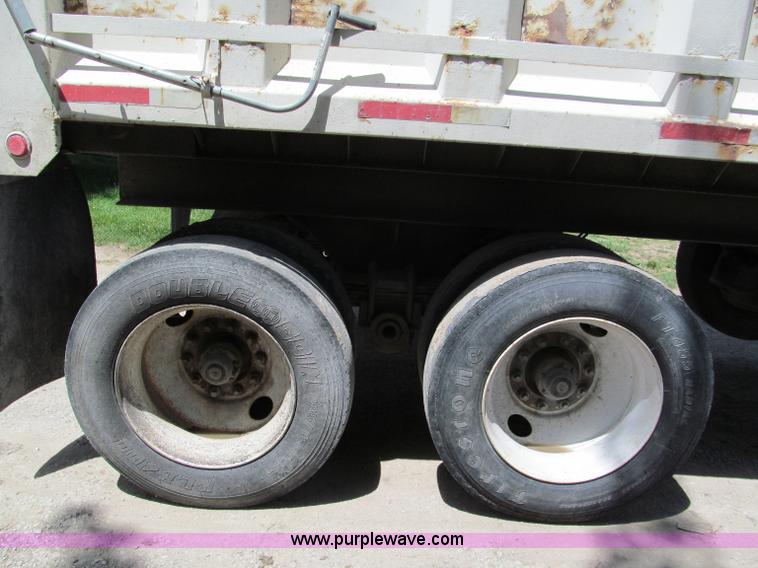 image for item C2169 1978 Copcow triple axle end dump trailer