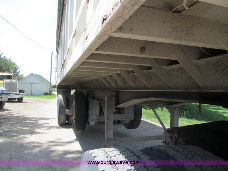image for item C2169 1978 Copcow triple axle end dump trailer