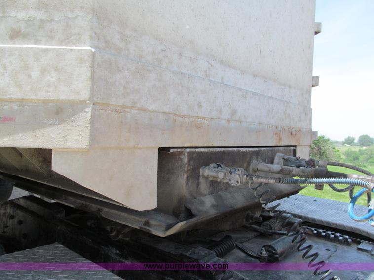 image for item C2169 1978 Copcow triple axle end dump trailer