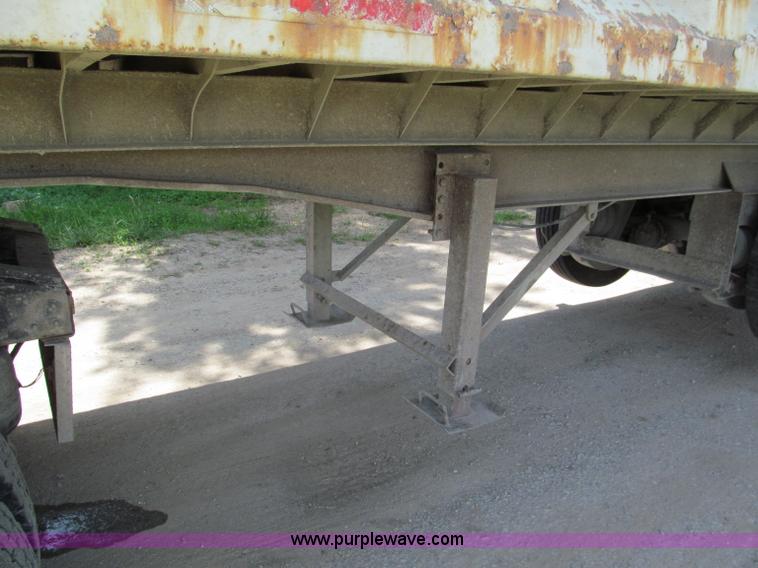 image for item C2169 1978 Copcow triple axle end dump trailer