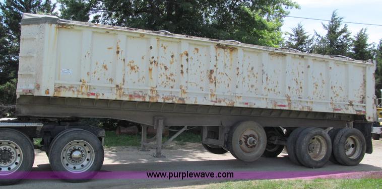 image for item C2169 1978 Copcow triple axle end dump trailer