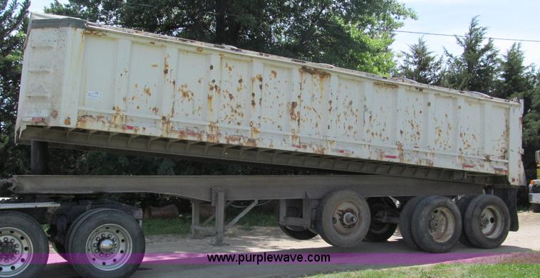 image for item C2169 1978 Copcow triple axle end dump trailer