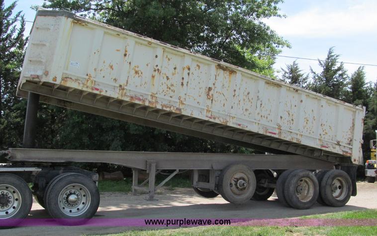 image for item C2169 1978 Copcow triple axle end dump trailer