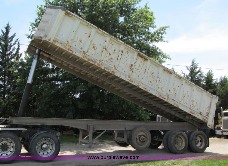 image for item C2169 1978 Copcow triple axle end dump trailer