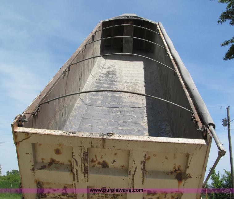 image for item C2169 1978 Copcow triple axle end dump trailer