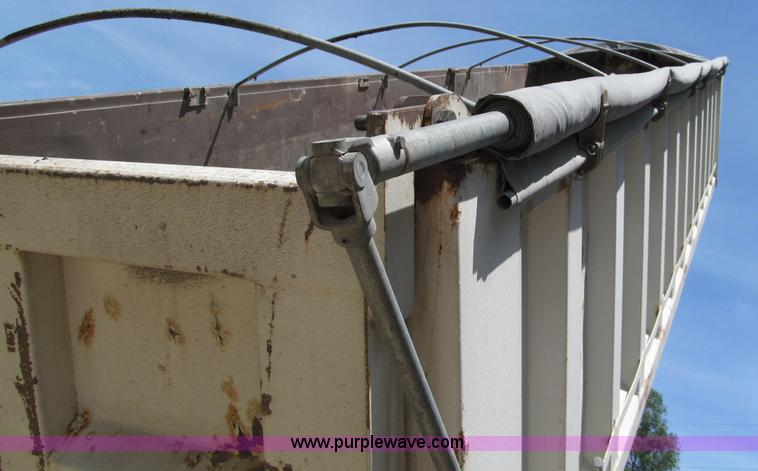 image for item C2169 1978 Copcow triple axle end dump trailer