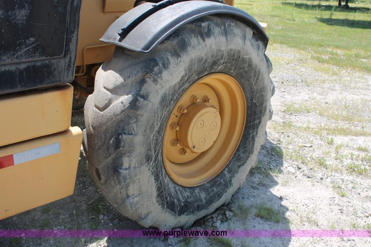 image for item C2511 2000 Caterpillar TH103 telehandler