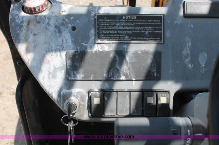 image for item C2511 2000 Caterpillar TH103 telehandler