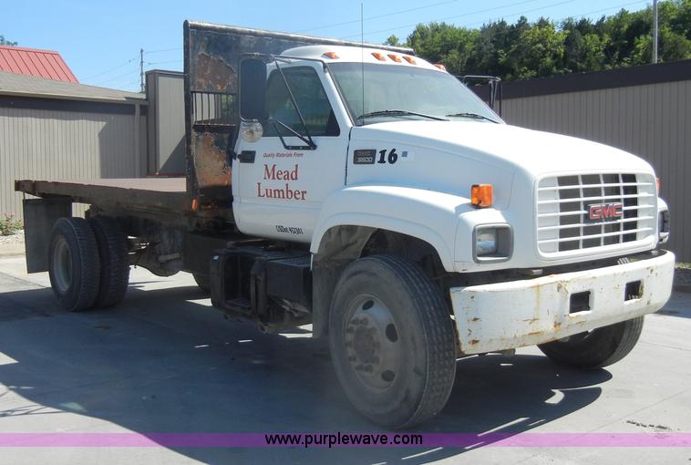 image for item D4117 1998 GMC C6500 flatbed truck
