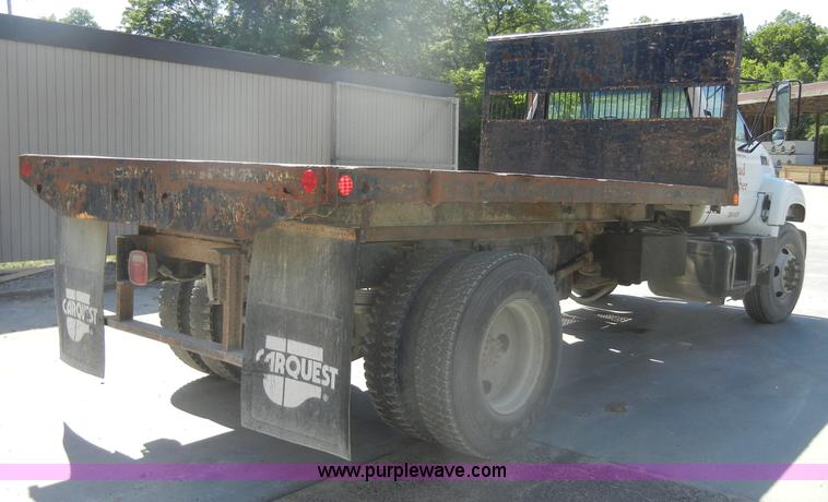 image for item D4117 1998 GMC C6500 flatbed truck