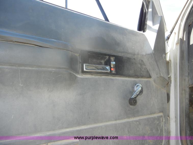 image for item D4117 1998 GMC C6500 flatbed truck