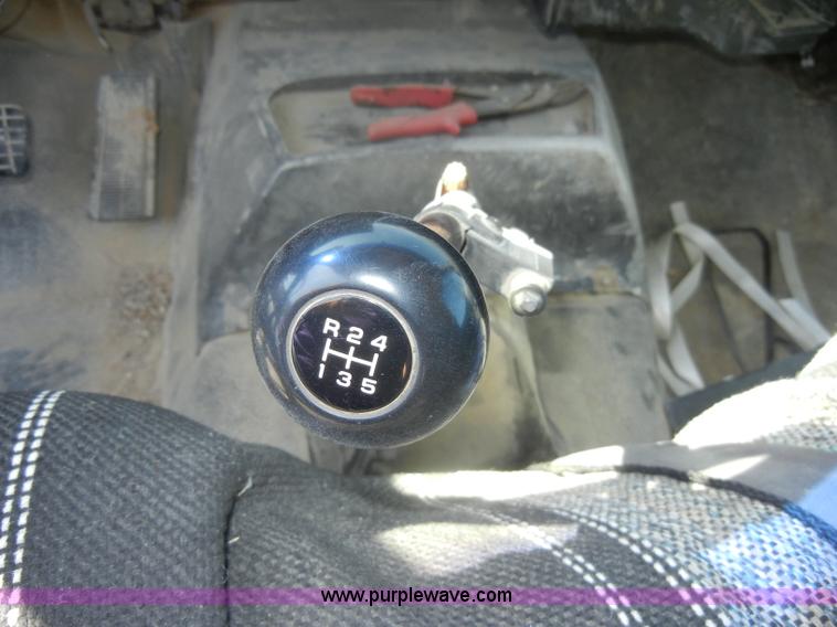 image for item D4117 1998 GMC C6500 flatbed truck