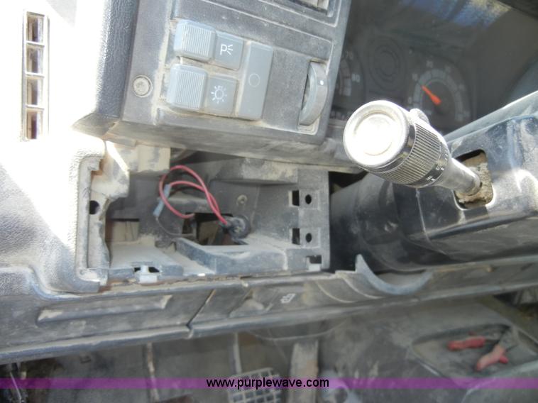 image for item D4117 1998 GMC C6500 flatbed truck