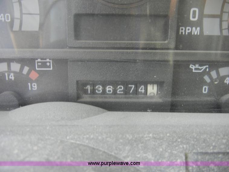 image for item D4117 1998 GMC C6500 flatbed truck