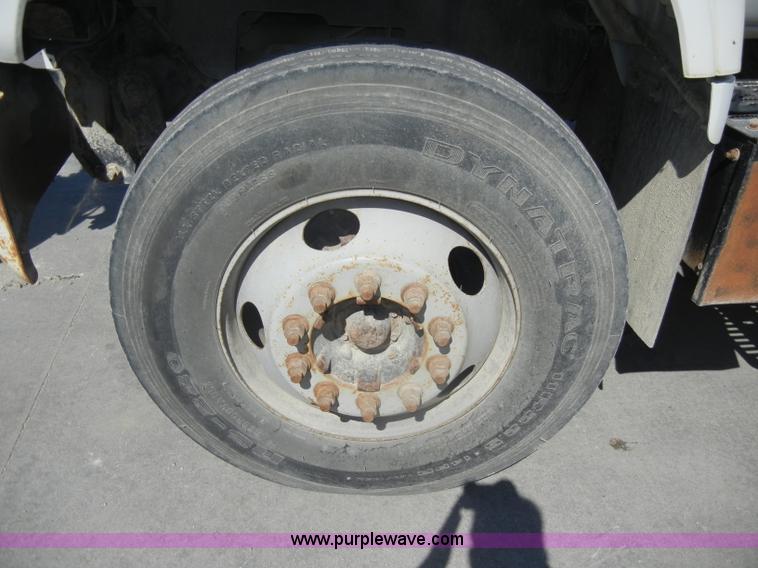 image for item D4117 1998 GMC C6500 flatbed truck