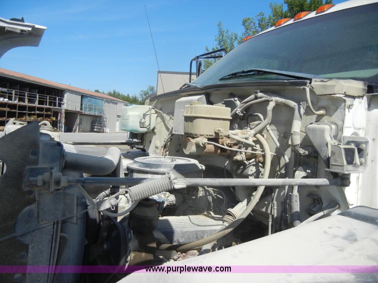 image for item D4117 1998 GMC C6500 flatbed truck