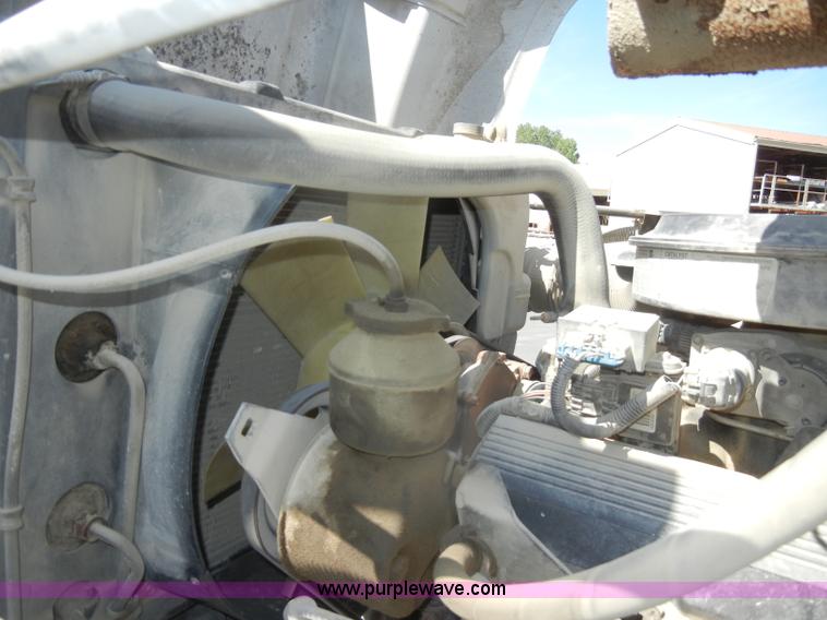 image for item D4117 1998 GMC C6500 flatbed truck