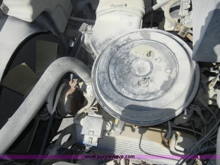 image for item D4117 1998 GMC C6500 flatbed truck