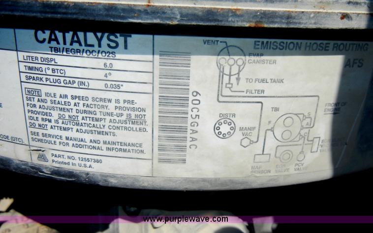 image for item D4117 1998 GMC C6500 flatbed truck