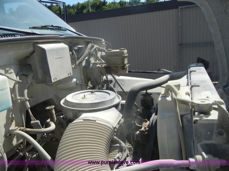 image for item D4117 1998 GMC C6500 flatbed truck