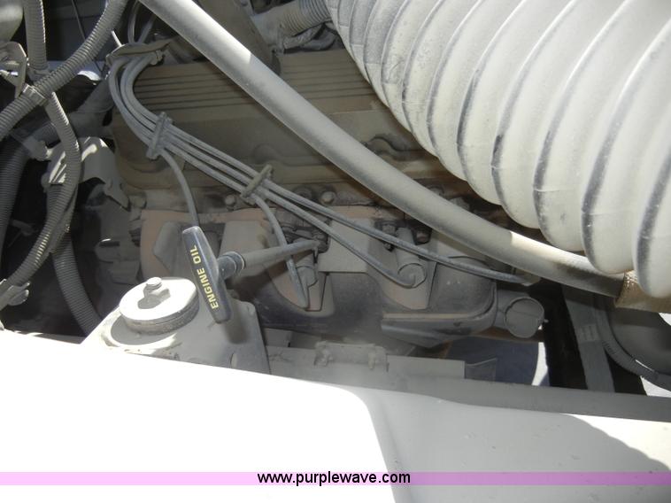 image for item D4117 1998 GMC C6500 flatbed truck