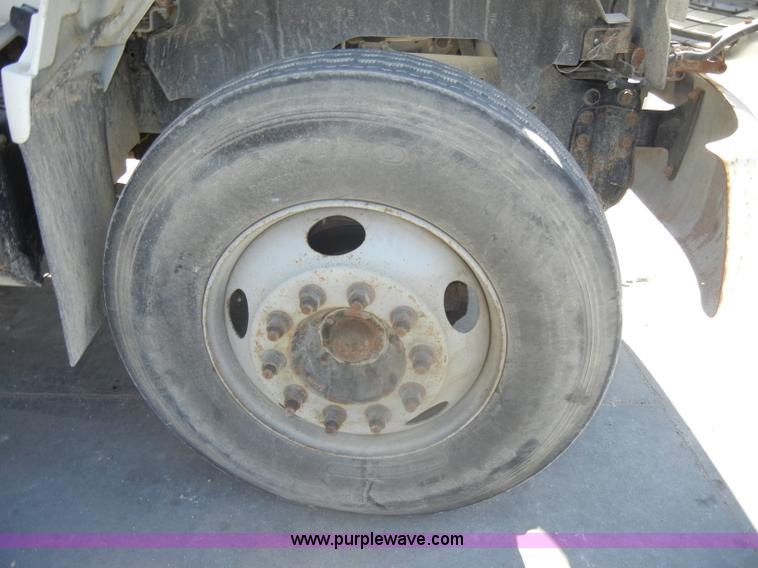 image for item D4117 1998 GMC C6500 flatbed truck