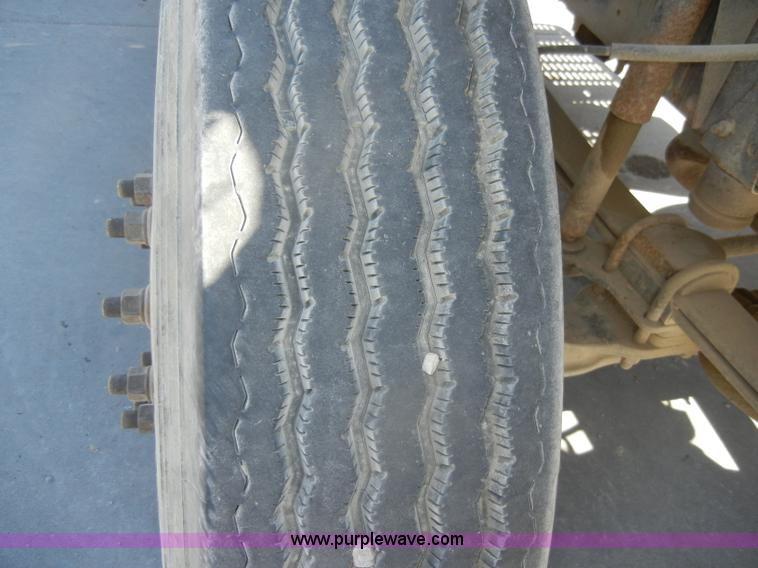 image for item D4117 1998 GMC C6500 flatbed truck