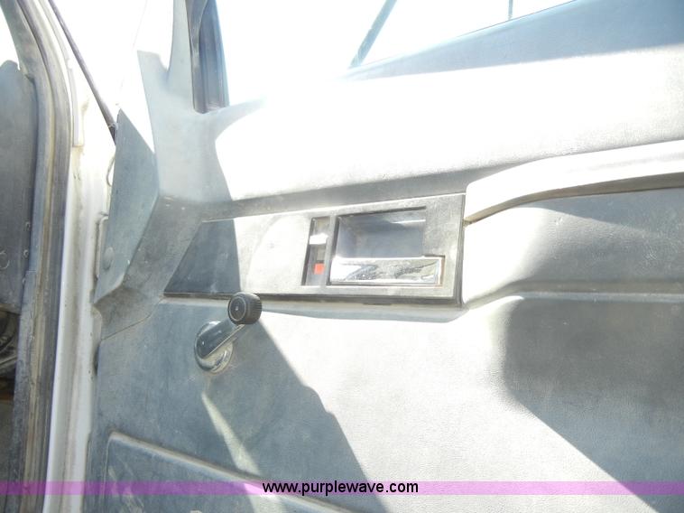 image for item D4117 1998 GMC C6500 flatbed truck