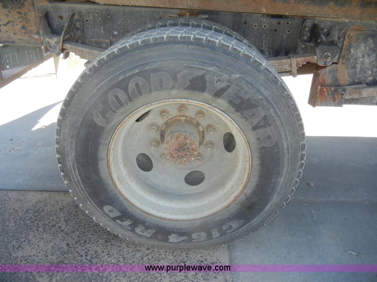 image for item D4117 1998 GMC C6500 flatbed truck