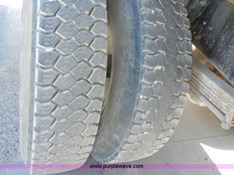 image for item D4117 1998 GMC C6500 flatbed truck