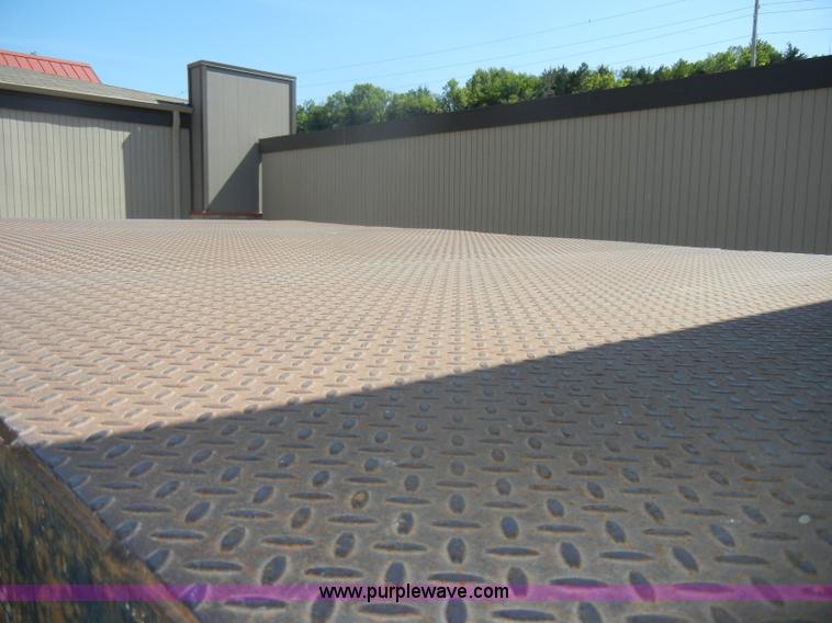 image for item D4117 1998 GMC C6500 flatbed truck