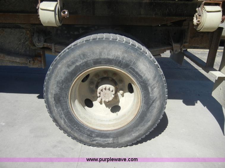 image for item D4117 1998 GMC C6500 flatbed truck