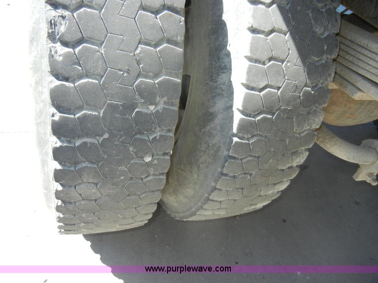 image for item D4117 1998 GMC C6500 flatbed truck